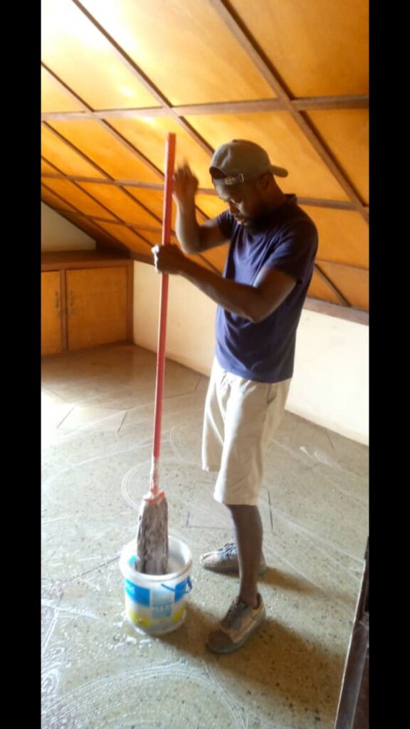 Norvisi working as a cleaner